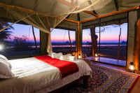 The tents are light, airy and spacious with large beds draped with mosquito nets.