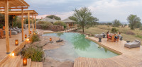 Sayari - guests enjoying private dining by the pool 