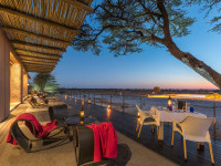 Onguma The Fort's main deck with views across the waterhole towards Fischer's Pan in Etosha