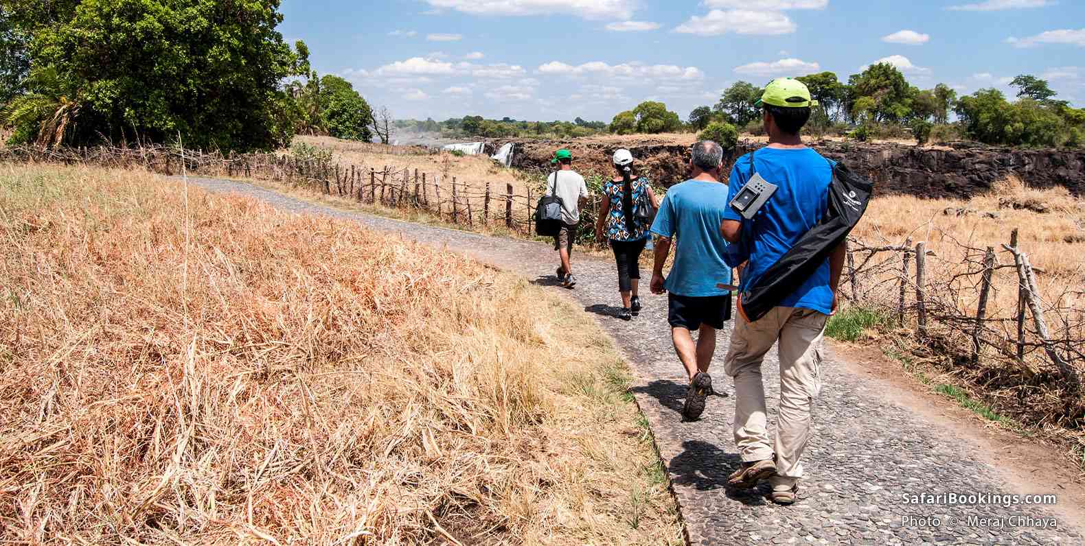 Travelers walking on the Zimbabwean side of Victoria Falls