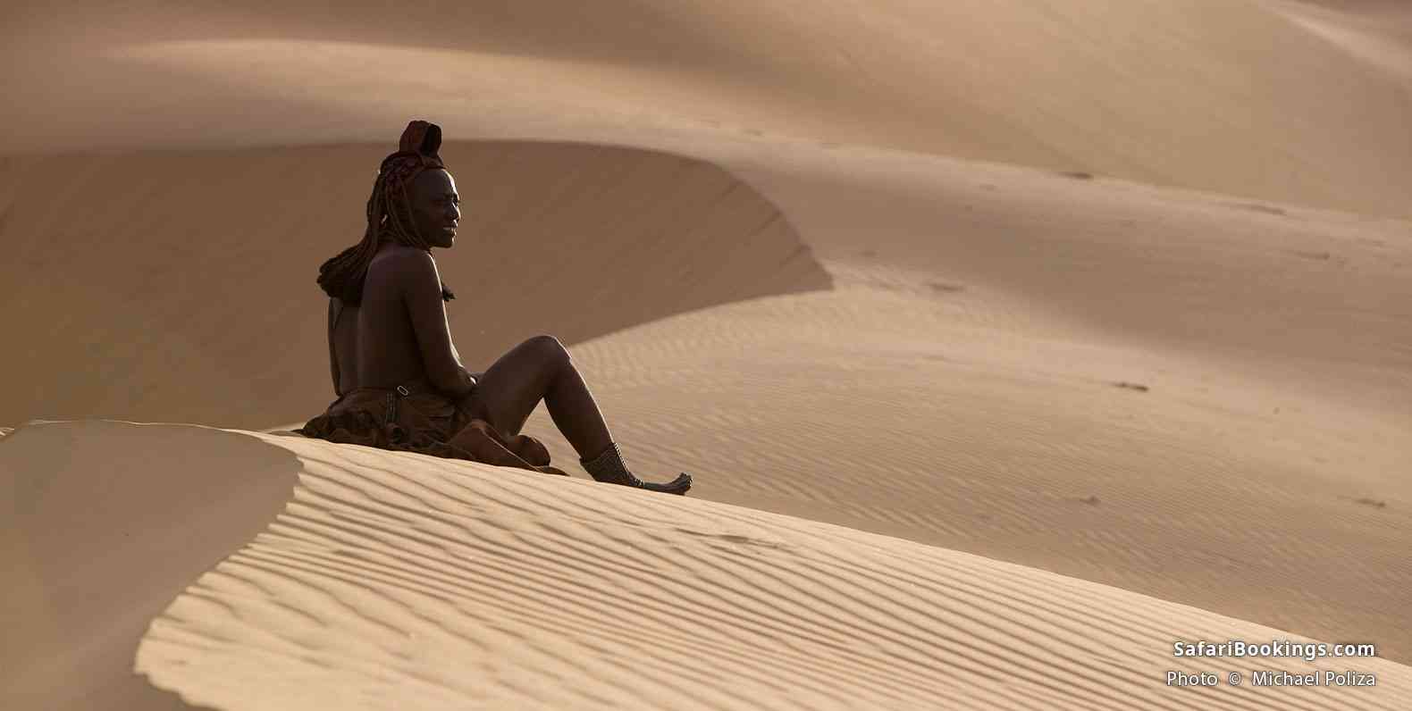 Himba woman in the dunes