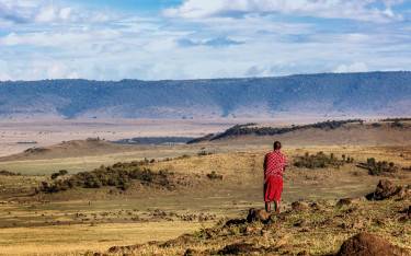 Maasai man looking out over the plains