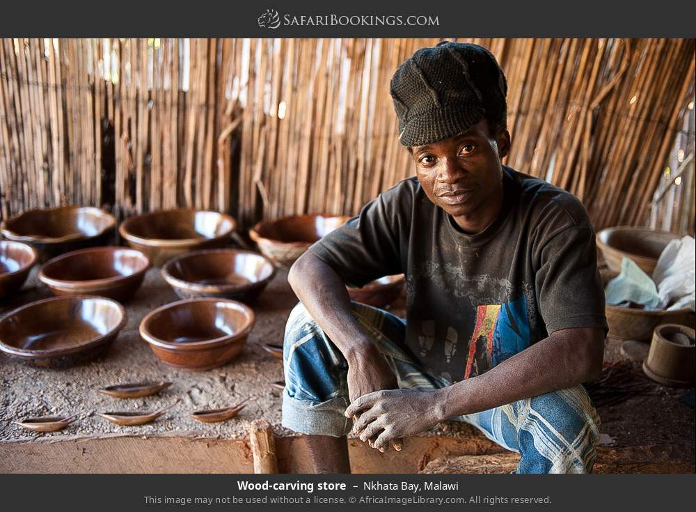 Vendor at a wood-carving store in Nkhata Bay, Malawi