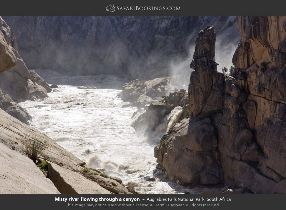 Misty river flowing through a canyon in Augrabies Falls National Park, South Africa