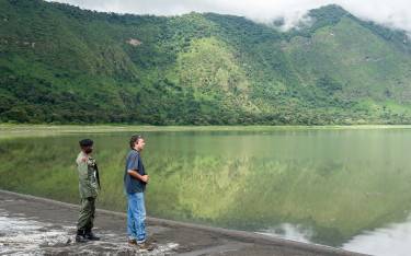 Traveler and park ranger in Empakaai Crater in the Ngorongoro Conservation Area
