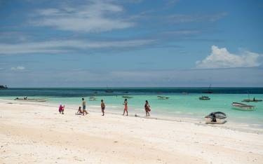 Thumbnail of Visitors on the beach