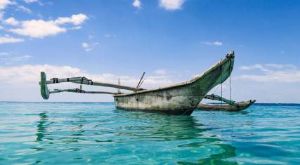 Dhow on turquoise water