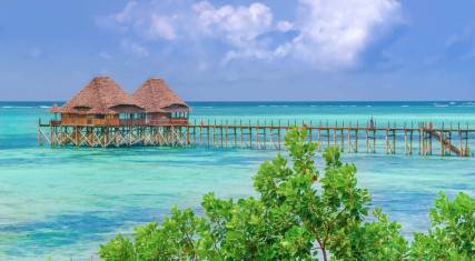 Jetty leading to an overwater bar at Pwani Mchangani