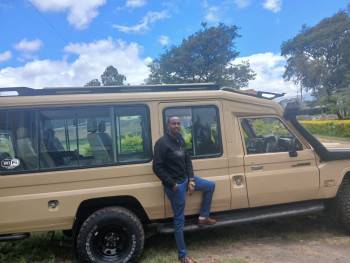 The director and the two team members, on a trip o