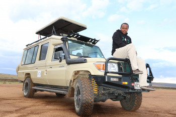 Our head tour guide Danson while on safari