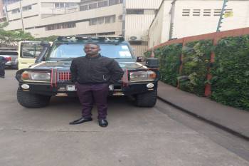 Our sales manager infront of our tour vehicle